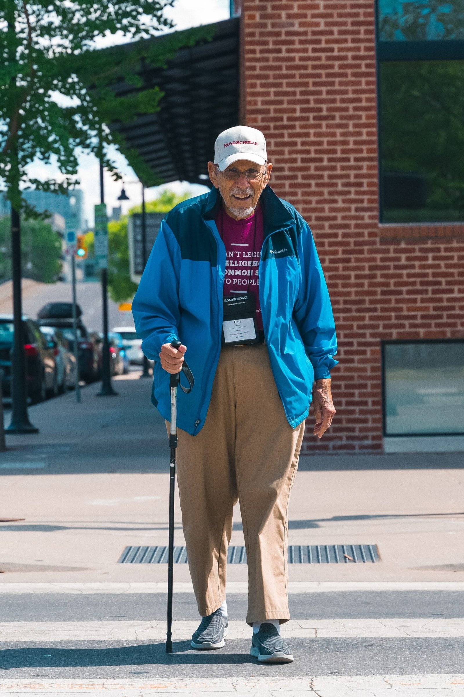 Road Scholar participant using a walking stick during a walking tour in Tulsa, Oklahoma